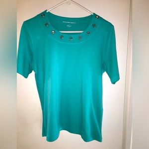 Women’s short sleeve small teal shirt with rivet detail on neckline.